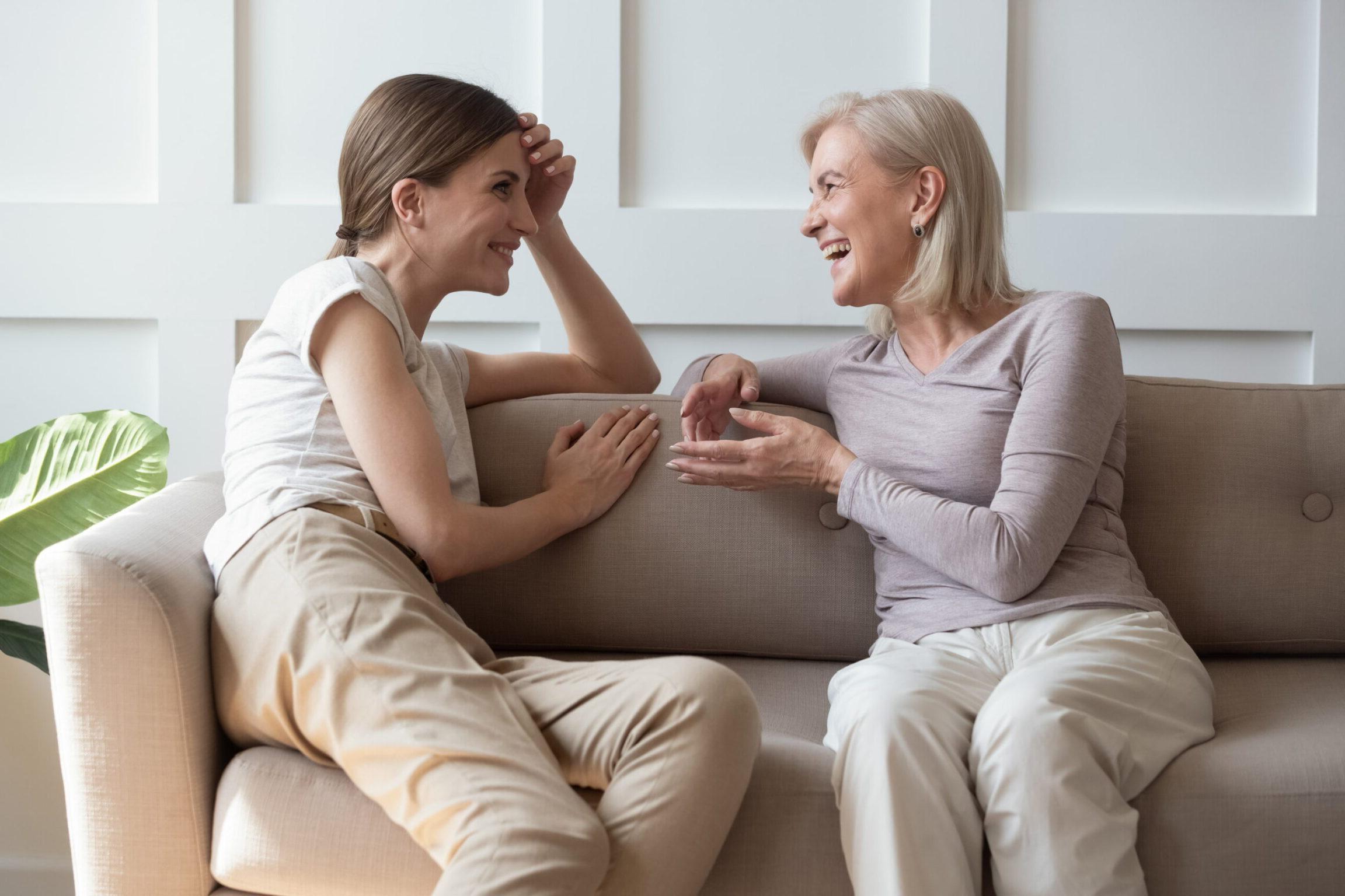 Two women discussing genetics and their weight loss journey